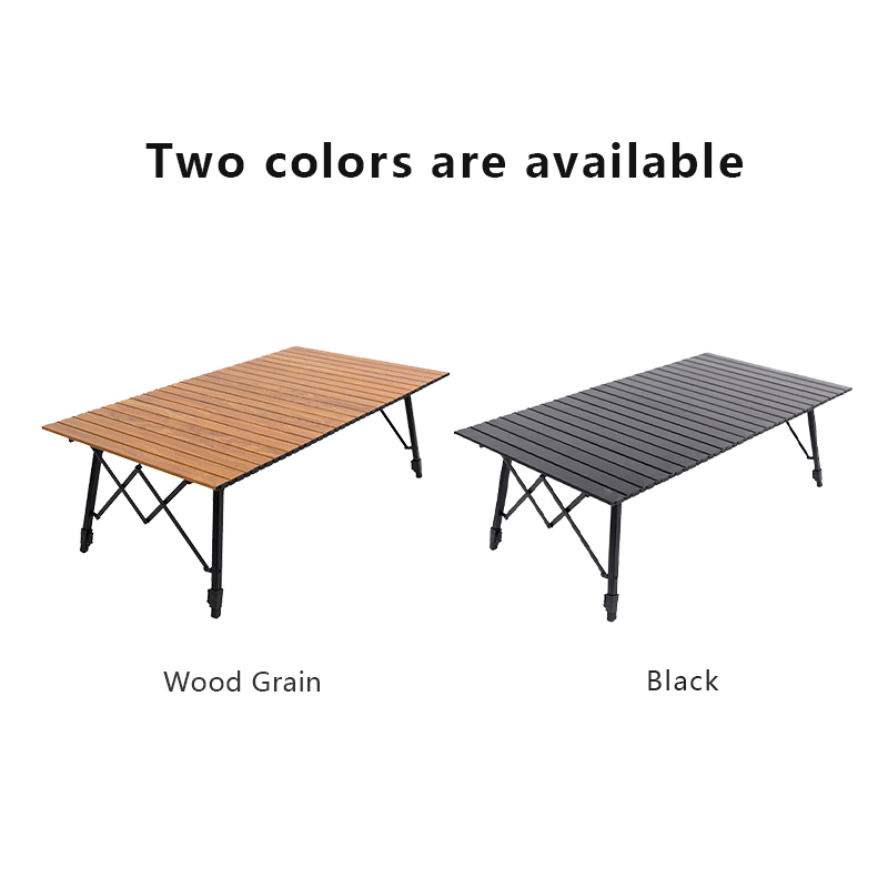 Adjustable aluminum camping table leveled on uneven ground